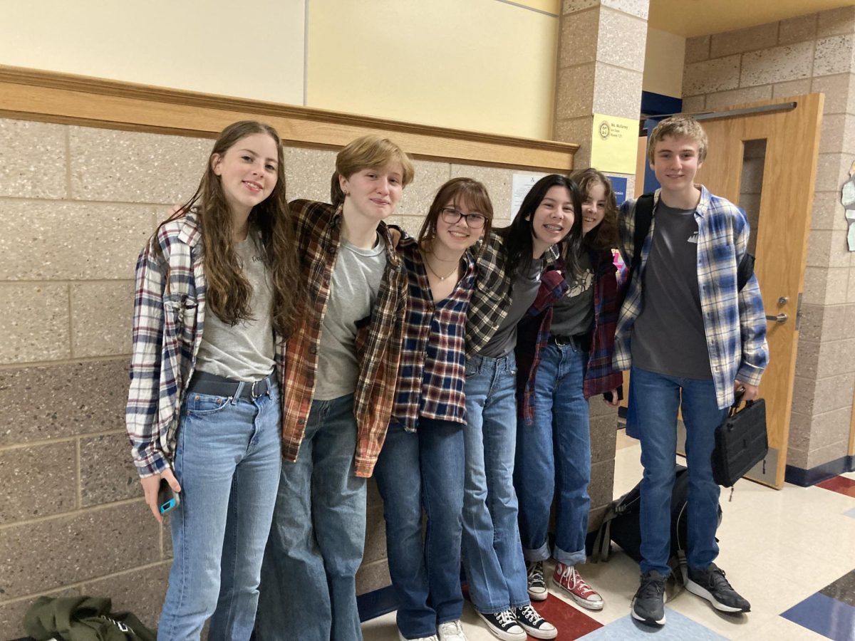 Freshman Sienna Powers and friends twinning with their plaid. 