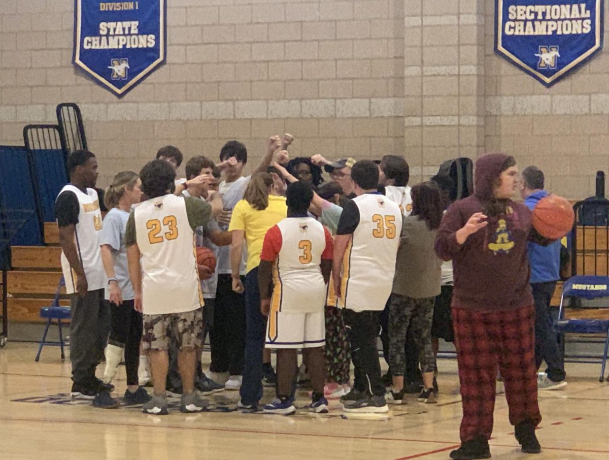 The unified b-ball team celebrates their win against the Ashland Clockers on Monday, October 7. 