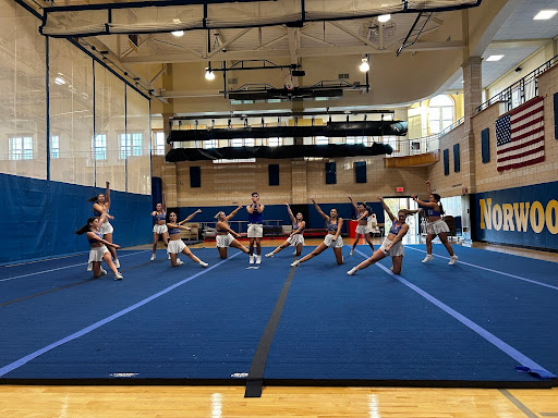 The cheer team goes "full out."