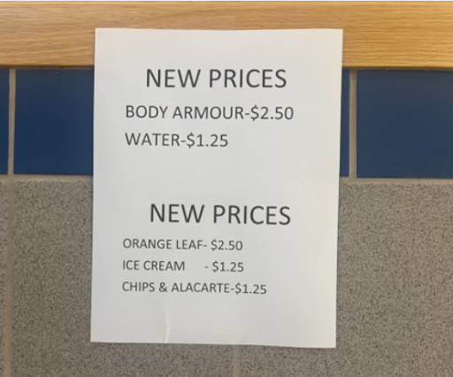 A sign in the cafeteria announcing the new prices.