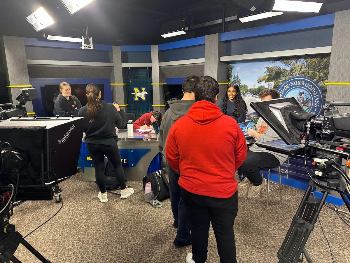 A portion of the STN crew discussing early plans in the studio. (Taken by Mrs. Schnatterly)
