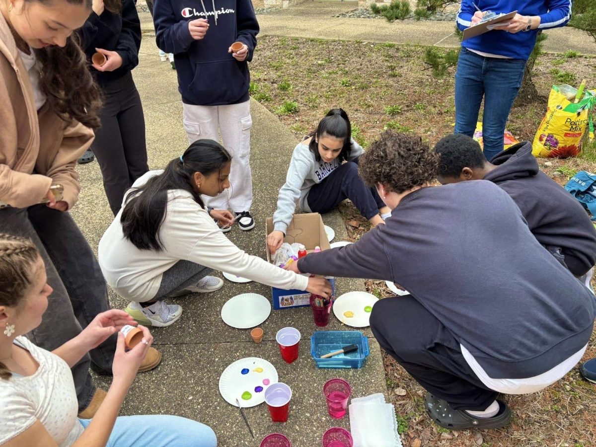 Students painting their pots