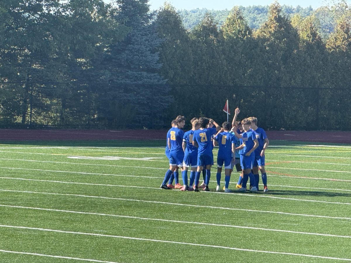 Mustangs huddling before kick-off