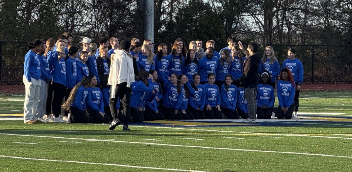 Senior players and coaching staff gather for team photos