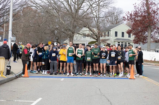 A big crowd eager to start running at the starting line of the Turkey Trot