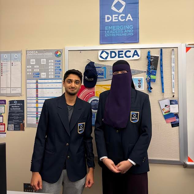 Co-presidents of DECA,  Yash Shah and Maryam Ozodova

