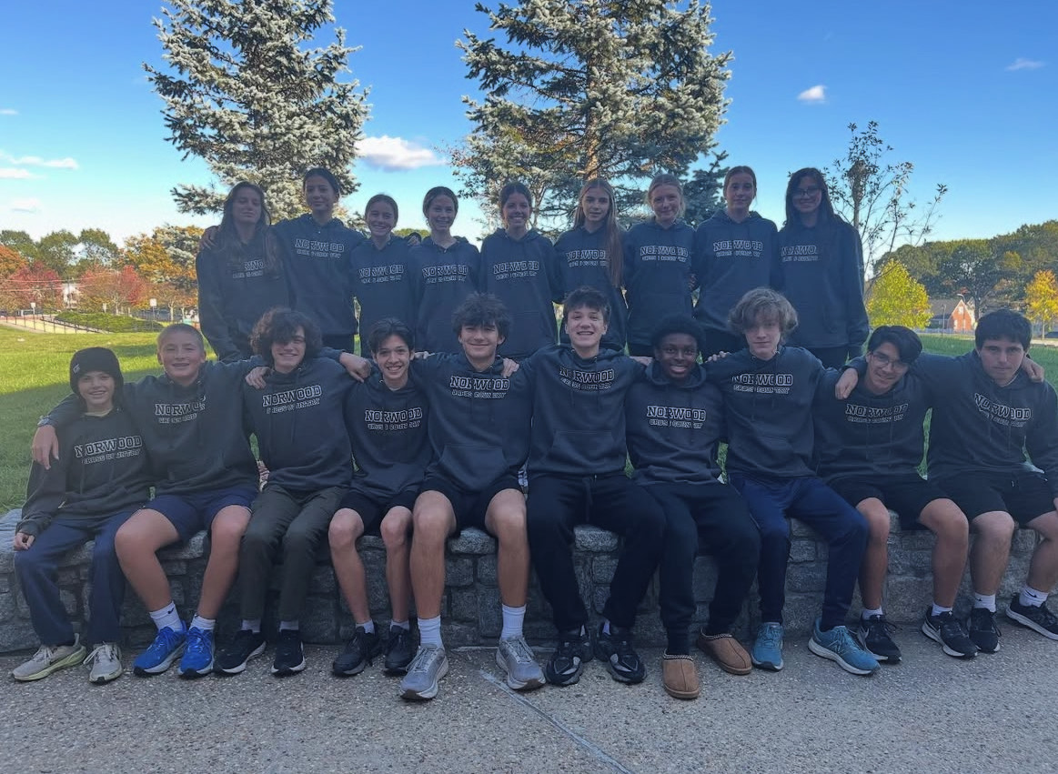 The cross country team in matching hoodies