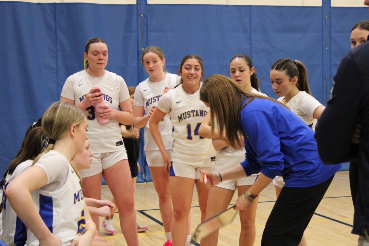 Coach McDonnell works with the team.