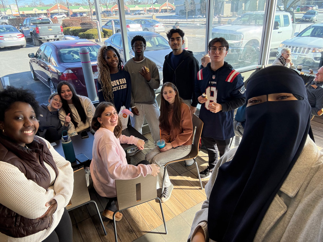 Impact Norwood stops at Dunkin' after going to the middle school for interactive lessons