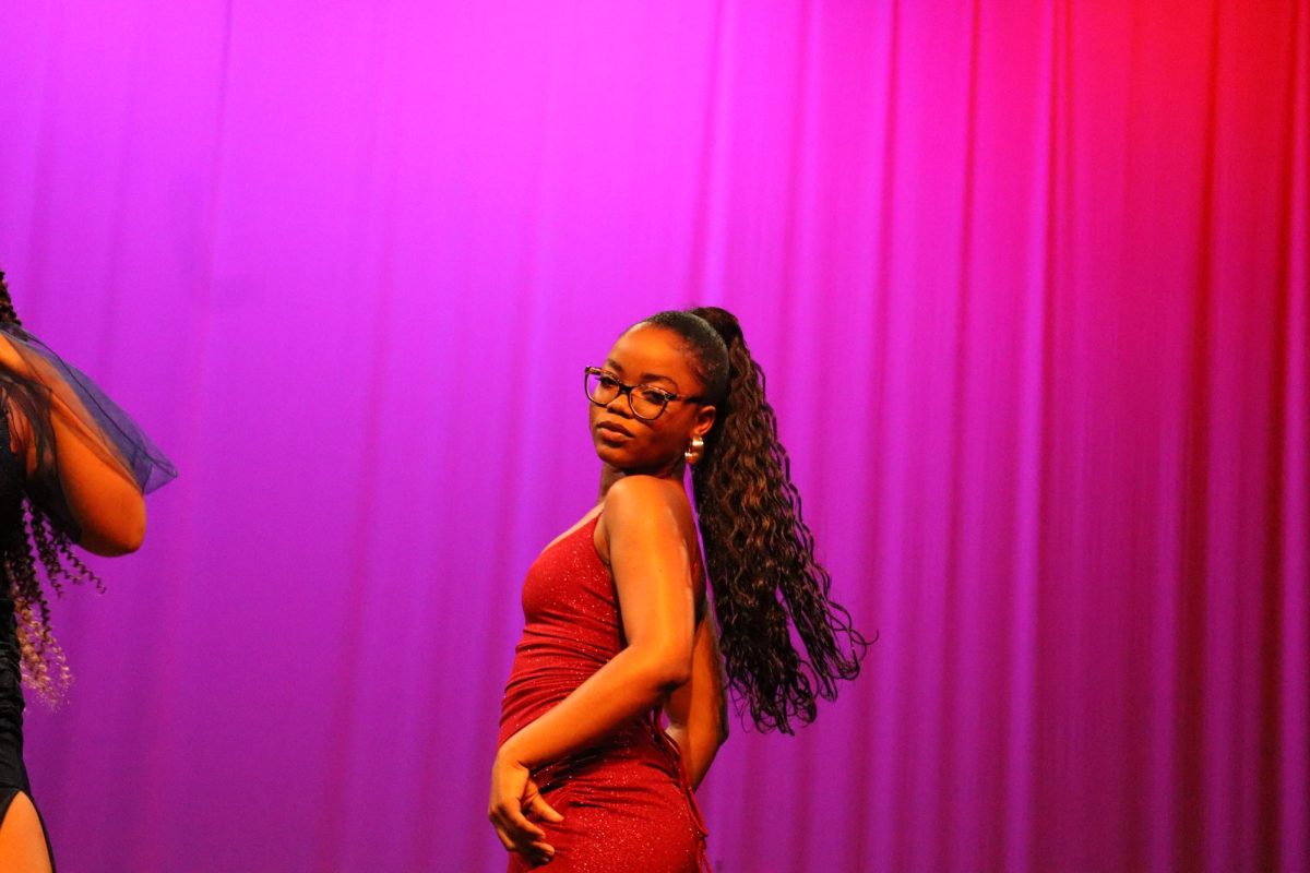 Rose Aristide showing off her dress