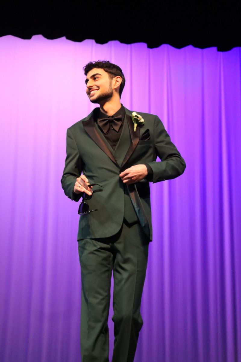 Peter Alzaeem looking dapper in his green tuxedo