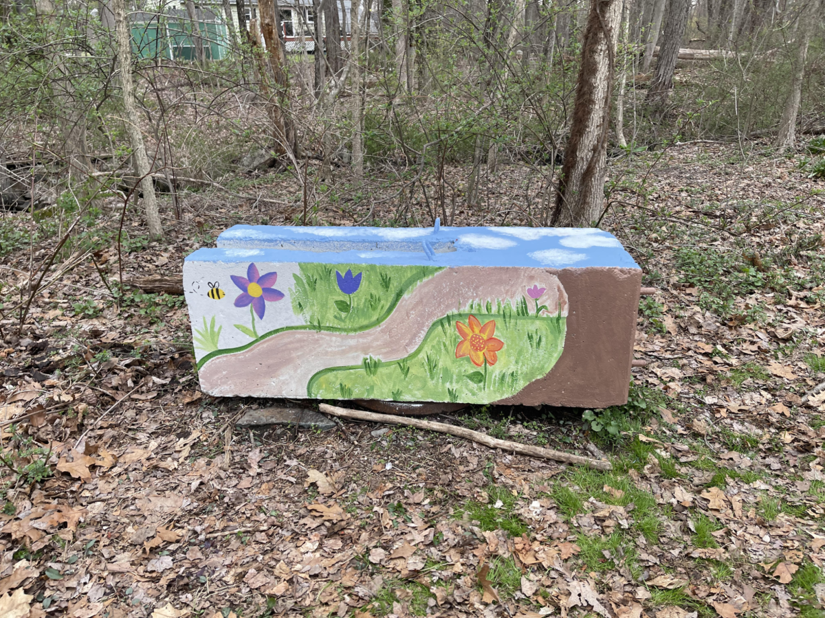 A cement block that was painted by EYC and Impact Norwood volunteers at the Earth Week Block Painting Event