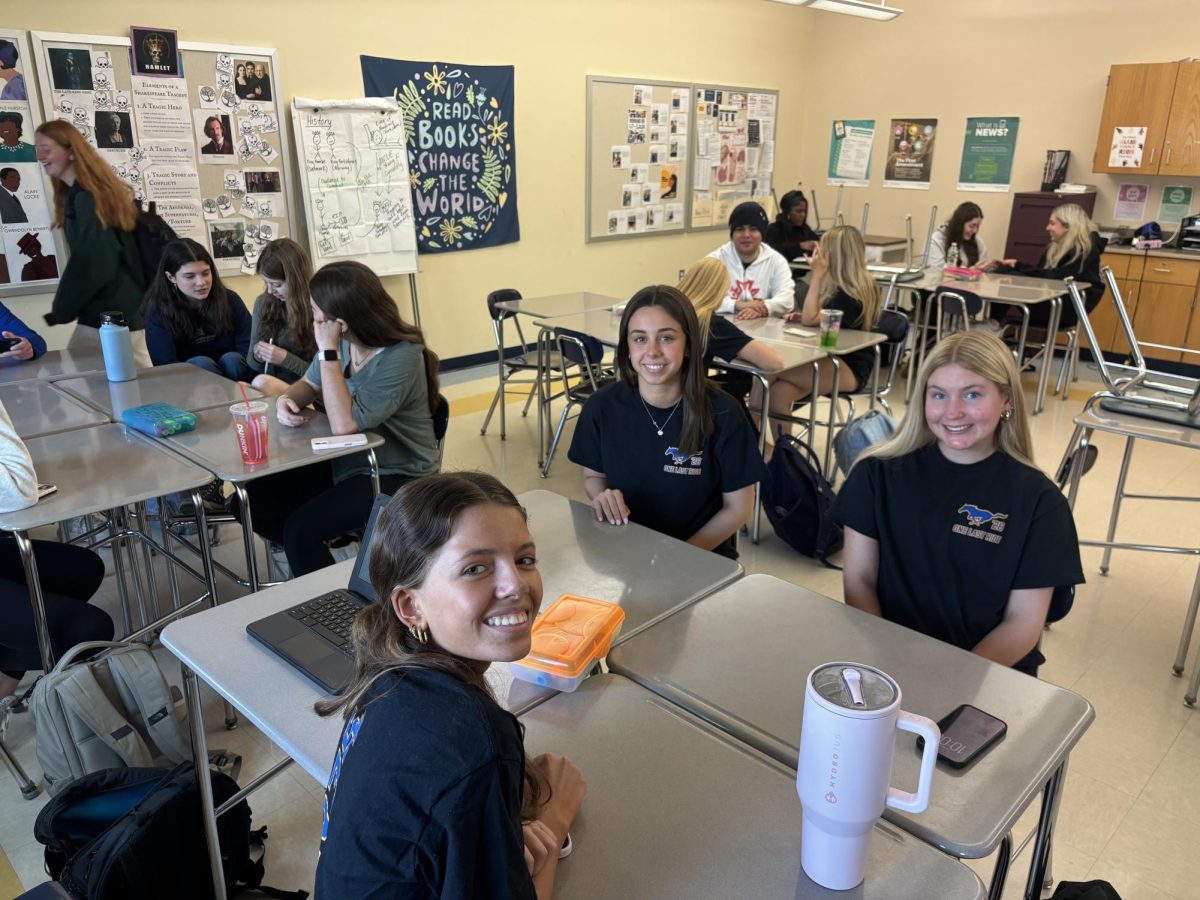 Kylie Letourneau, Maddie Ralli, and Katie Malley in Journalism class
