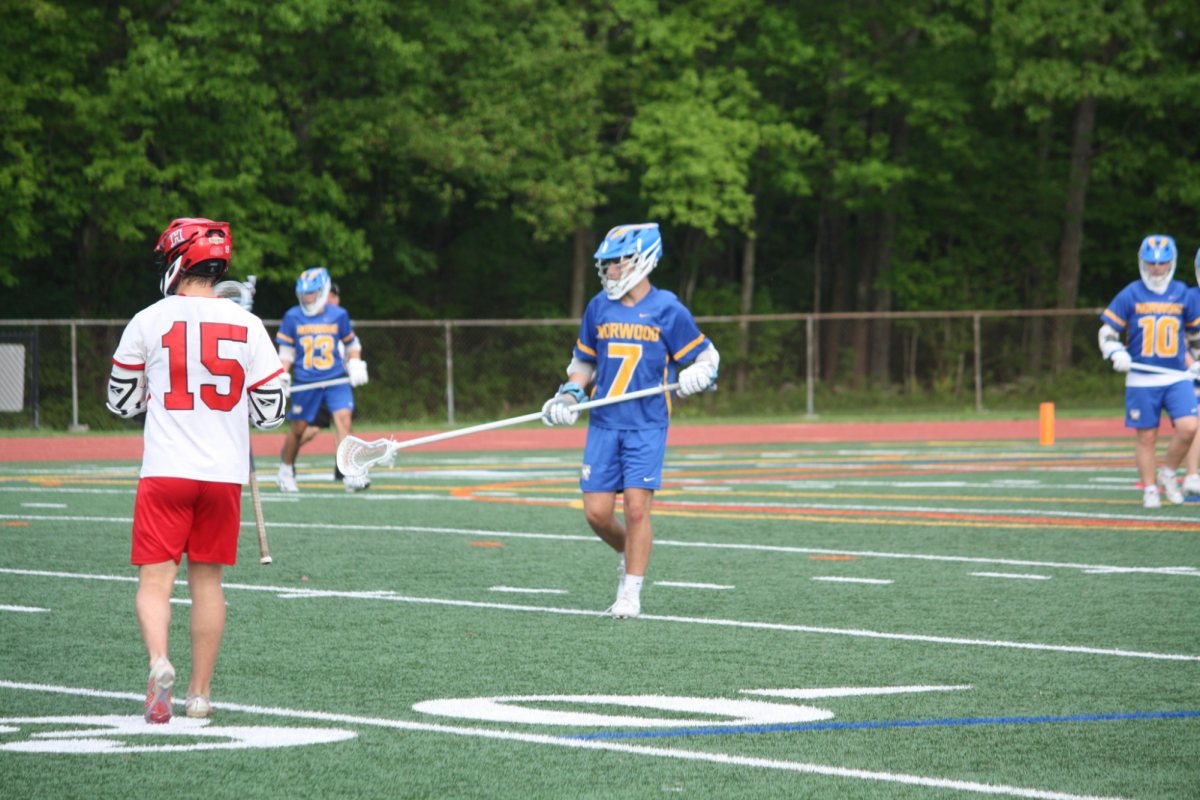 Jr. Captain John Walenten playing defense. 


Photo Credit: John Walenten
