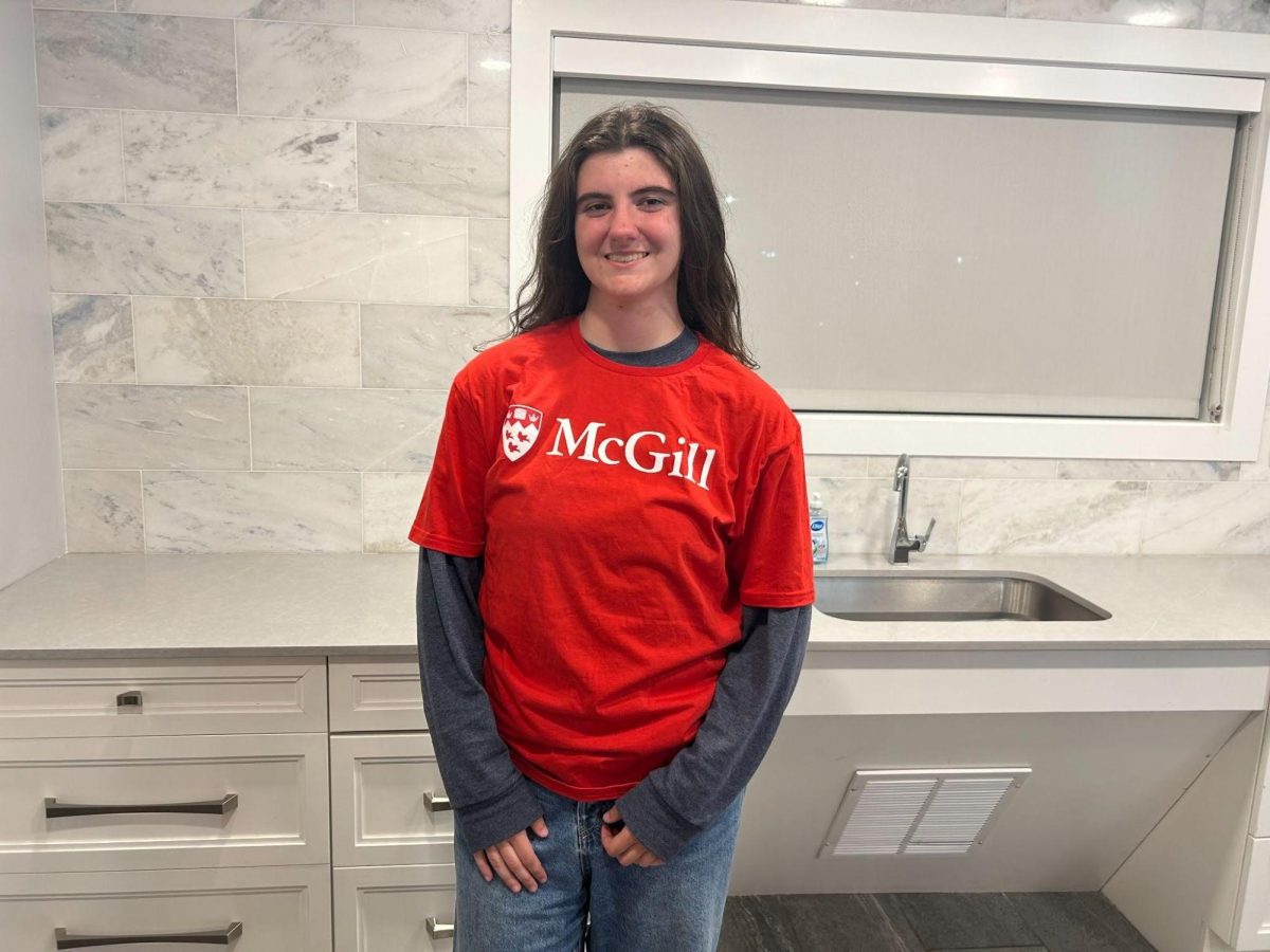 Sullivan reps her new school’s merchandise. Go Redbirds!